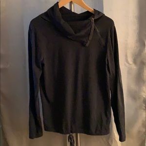 A symmetrical cowl neck blouse
